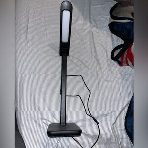 Wireless phone charging lamp